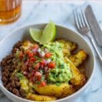 Loaded Potato Taco Bowl with Crispy Potatoes, Spiced Beef, Guacamole, and Salsa Recipe