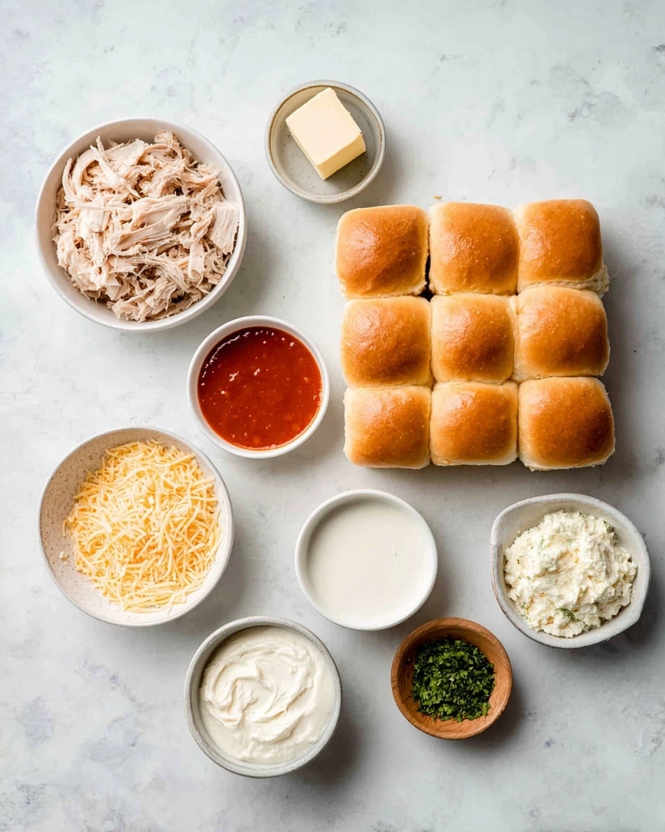The image shows ingredients placed on a white marbled surface: a white bowl with shredded light beige cooked chicken on the top left, a small white bowl with light butter cube in the center, a small white bowl with bright red hot sauce top right, another white bowl with shredded pale yellow cheese below the chicken, a small white bowl with creamy ranch dressing below the cheese, a white bowl with thick white cream cheese near the bottom center, a tiny wooden bowl with green chopped herbs on the bottom right, and a set of twelve soft, golden-brown slider buns arranged in a 3 by 4 grid to the right center. Photo taken with an iphone --ar 4:5 --v 7