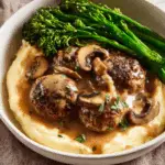 Smothered Rissoles with Mushroom Gravy over Mashed Potato Recipe