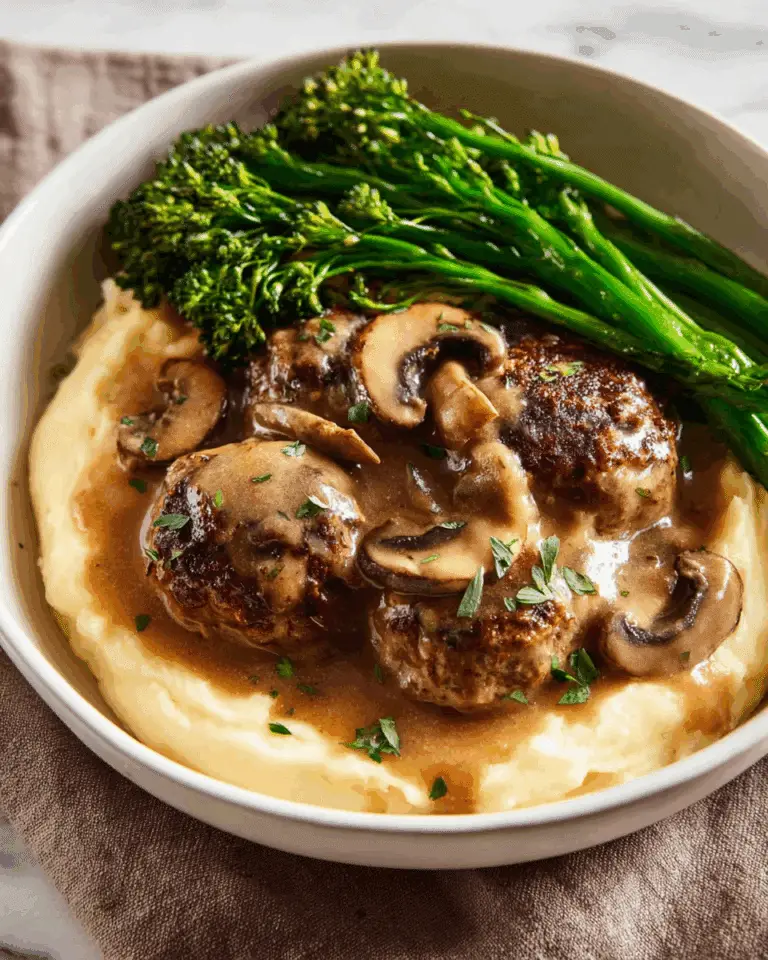 Smothered Rissoles with Mushroom Gravy over Mashed Potato Recipe