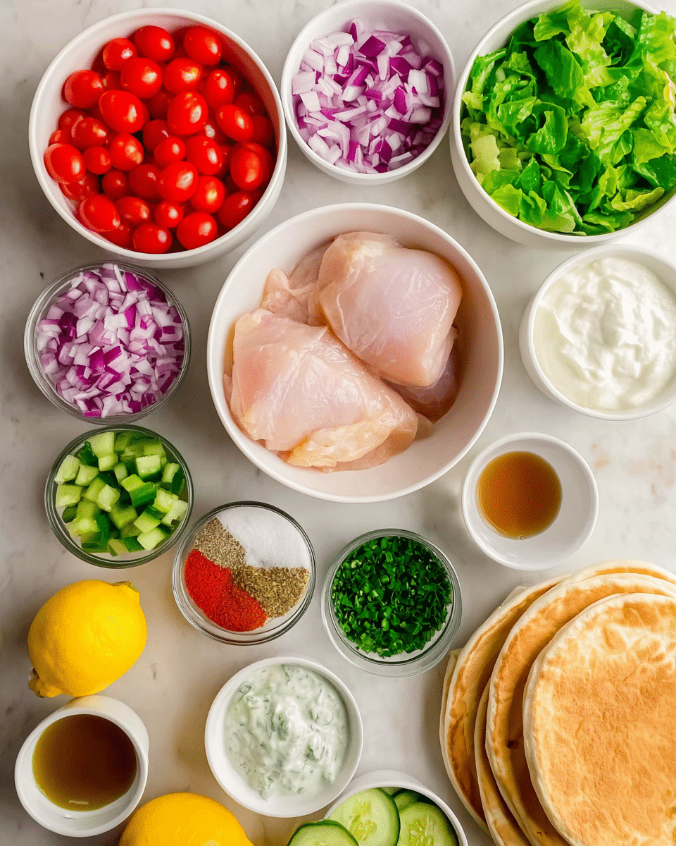 The image shows multiple white bowls arranged neatly on a white marbled surface, each containing different fresh ingredients. The largest bowl in the center holds two pieces of raw, pale pink chicken meat. Surrounding it are bowls layered with bright red cherry tomatoes, chopped light green cucumber, chopped purple onions, and vibrant green lettuce leaves. Smaller bowls hold creamy white yogurt, a lemon, a small bowl of green seasoning, a small bowl filled with brown liquid, and a white bowl containing a mix of red, beige, and brown spices. To the right, there are golden brown flatbread rounds stacked neatly. The overall setup is clean, colorful, and organized, ready for cooking or assembly. Photo taken with an iphone --ar 4:5 --v 7