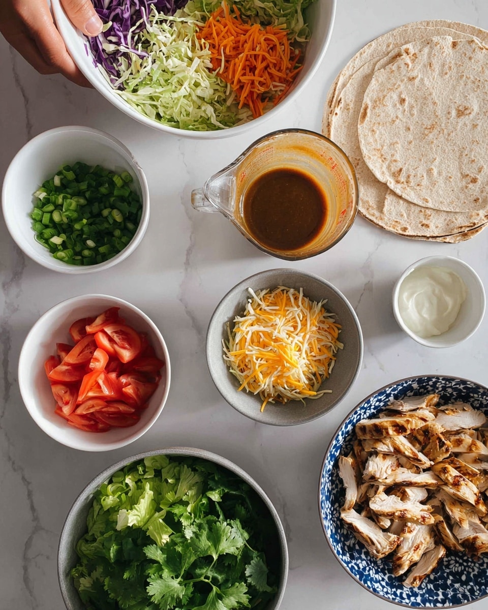 The image shows a top view of several white bowls and a blue patterned bowl arranged on a white marbled surface, each containing different food items for making wraps. One white bowl has a mix of shredded green, purple cabbage, and orange carrots. Another white bowl contains fresh chopped green lettuce. A small white bowl holds chopped green onions, while another has plain white sauce. The blue patterned bowl is filled with a mix of shredded yellow and white cheese. Sliced red tomato pieces rest beside one white bowl, and a gray bowl holds fresh green cilantro leaves. Another white bowl is filled with grilled, sliced chicken pieces with a slightly browned surface. Two whole wheat flatbreads lie partially stacked on the side. A clear glass measuring cup with brown sauce is positioned near the top of the image, with a woman's hand reaching toward it. The photo taken with an iphone --ar 4:5 --v 7