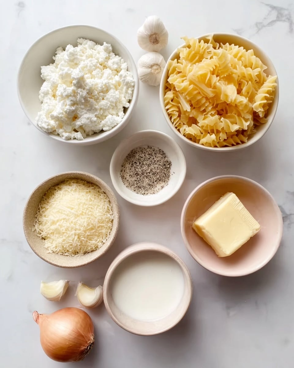 The image shows a collection of cooking ingredients on a white marbled surface arranged neatly. There are six small bowls and some loose ingredients. The top left bowl contains white cottage cheese with a soft, crumbly texture. Next to it on the right is a small white bowl filled with black pepper and salt. On the right of that, there is a bowl with light yellow, wavy pasta. Below the cottage cheese, a beige bowl holds grated cheese with a fine texture. Below that, a white bowl has a small amount of milk. To the right of the milk, there is a pale pink bowl containing a yellow block of butter. Near the bowls, there are three peeled garlic cloves and a whole light brown onion with papery skin. Photo taken with an iphone --ar 4:5 --v 7
