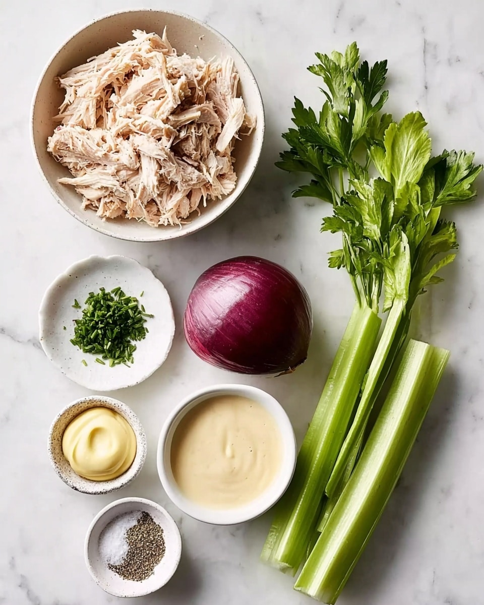 A white shallow bowl filled with light tan shredded cooked meat with a soft texture is positioned in the upper left. To its right is a small white bowl of creamy pale yellow sauce. Below these bowls, a deep purple whole onion sits to the left of a crisp green celery stalk. To the right of the celery are long green chives and a bunch of fresh flat green parsley. Near the lower left corner are two small white bowls; one contains coarse salt and black pepper, the other holds a dollop of pale yellow mustard. All items are arranged on a white marbled surface. Photo taken with an iphone --ar 4:5 --v 7