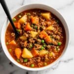 Hearty Hamburger Stew with Vegetables and Rich Tomato Broth Recipe