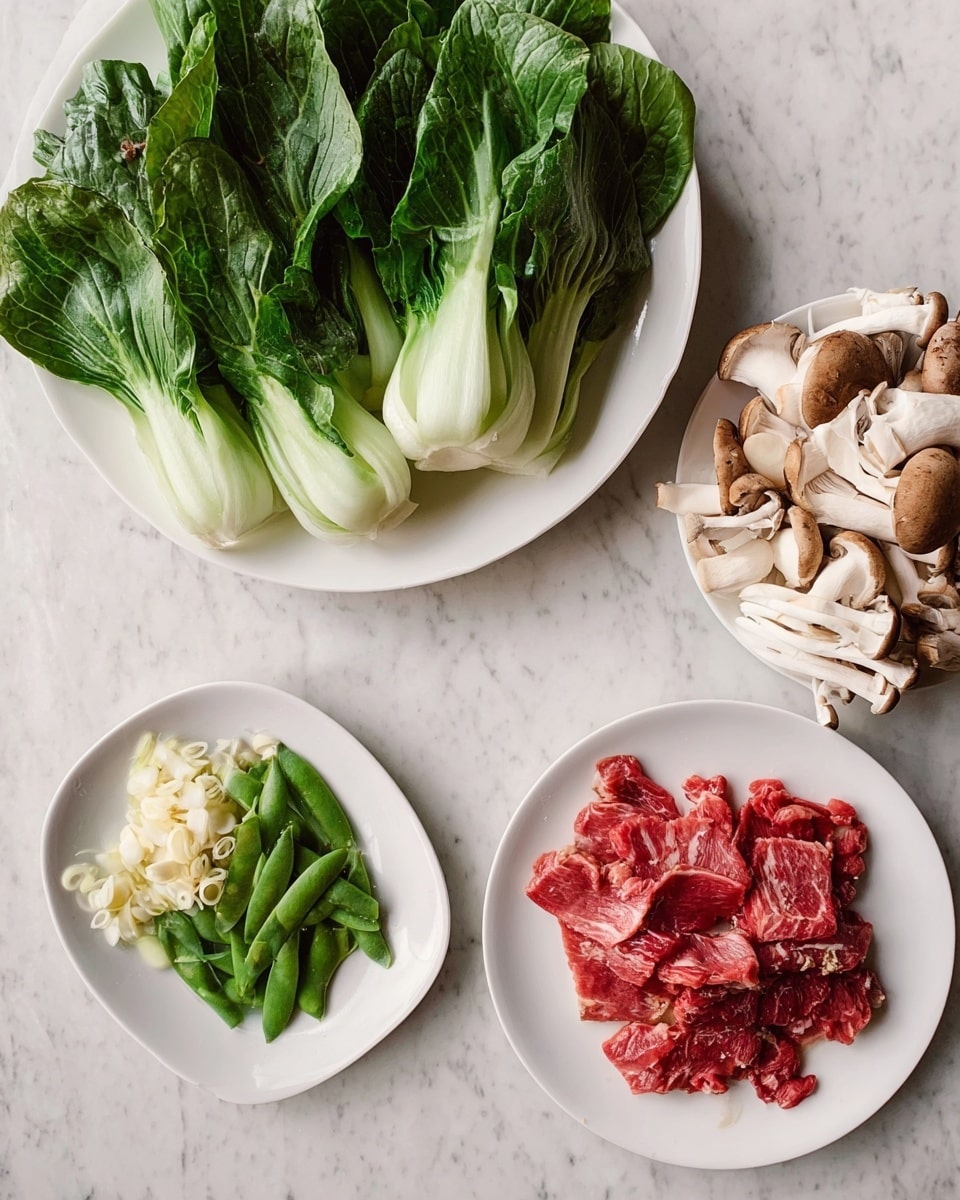 The image shows three white plates on a white marbled surface. The top left plate holds fresh green bok choy leaves, with white stalks visible under the leafy greens. The bottom left plate contains green snap peas on the left half and a mix of white and light brown shimeji mushrooms on the right half, with small piles of sliced garlic pieces off to the side. The right plate contains a pile of thin slices of red raw meat with some light marbling. photo taken with an iphone --ar 4:5 --v 7