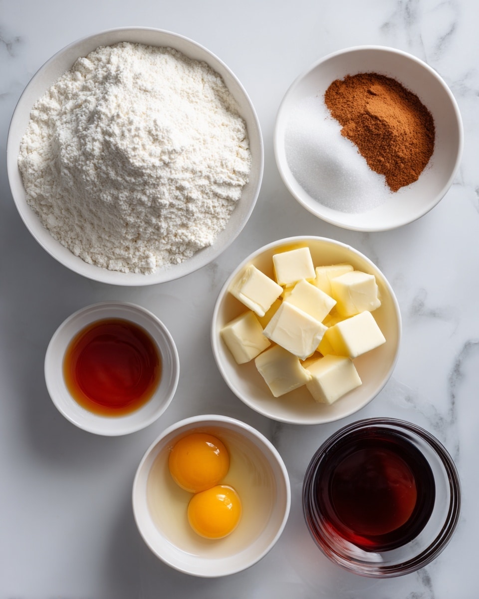 The image shows six parts of a recipe arranged on a white marbled surface. At the top is a white bowl filled with white flour and a small pile of cinnamon powder on the left side. Below that, slightly to the right, is a small pile of cubed butter resting on its white wrapper. Below the butter, there are three white bowls: the left one contains a mix of brown and white sugar, the middle one has two raw egg yolks and whites, and the smallest bowl to the left holds a reddish-brown liquid, likely syrup or honey. Finally, at the bottom right is a small glass bowl filled with a dark brown liquid, possibly vanilla extract. photo taken with an iphone --ar 4:5 --v 7