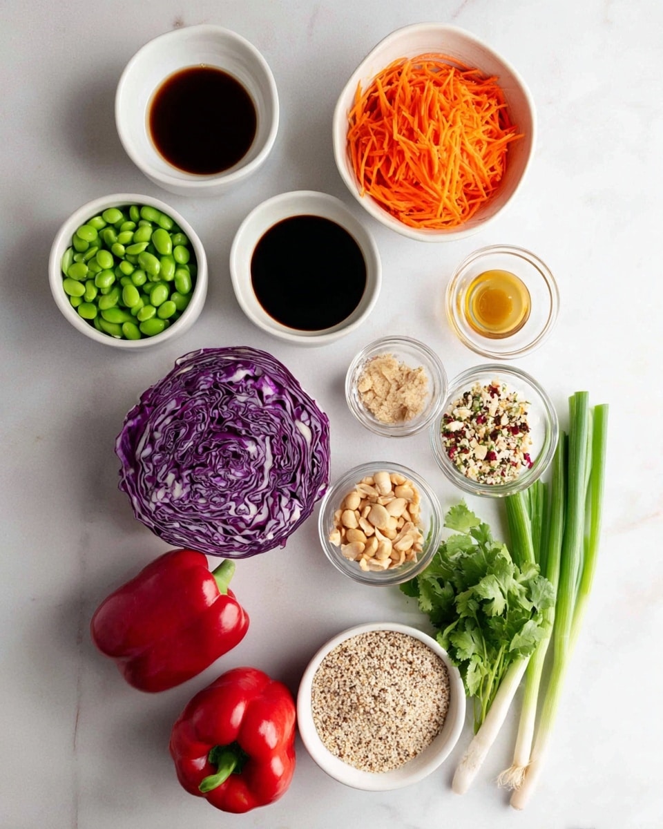 The image shows a collection of fresh ingredients arranged neatly on a white marbled surface. There are small white bowls containing dark soy sauce, a brown liquid, clear oil, a light yellow paste, minced ginger, minced garlic, and peanuts. In larger white bowls, shredded orange carrots, bright green edamame beans, and a mix of white and red quinoa grains are displayed. There is half a purple cabbage showing its intricate layers, a whole red onion, a bunch of fresh cilantro, three green onions with white roots, and two whole red bell peppers. The setup is clean and bright with natural light highlighting the colors. photo taken with an iphone --ar 4:5 --v 7