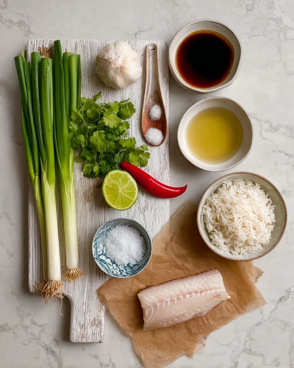 The image shows cooking ingredients arranged neatly on a white marbled surface. On the left side, a white wooden board holds three long green onions, fresh green cilantro, a whole white garlic bulb, a sliced lime half showing its light green inside, and a whole small red chili pepper. To the right of the board, two white bowls contain a light yellow liquid and a dark brown sauce. Above these, a small white spoon contains white granules. Next to these bowls, a small white bowl with a blue rim is filled with white rice. Below everything, a piece of light-colored raw fish is placed on brown parchment paper. A woman's hand is not visible in this image. The photo taken with an iphone --ar 4:5 --v 7