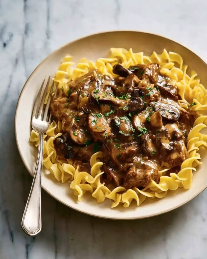 Chicken with Balsamic Mushroom Sauce and Buttered Egg Noodles Recipe