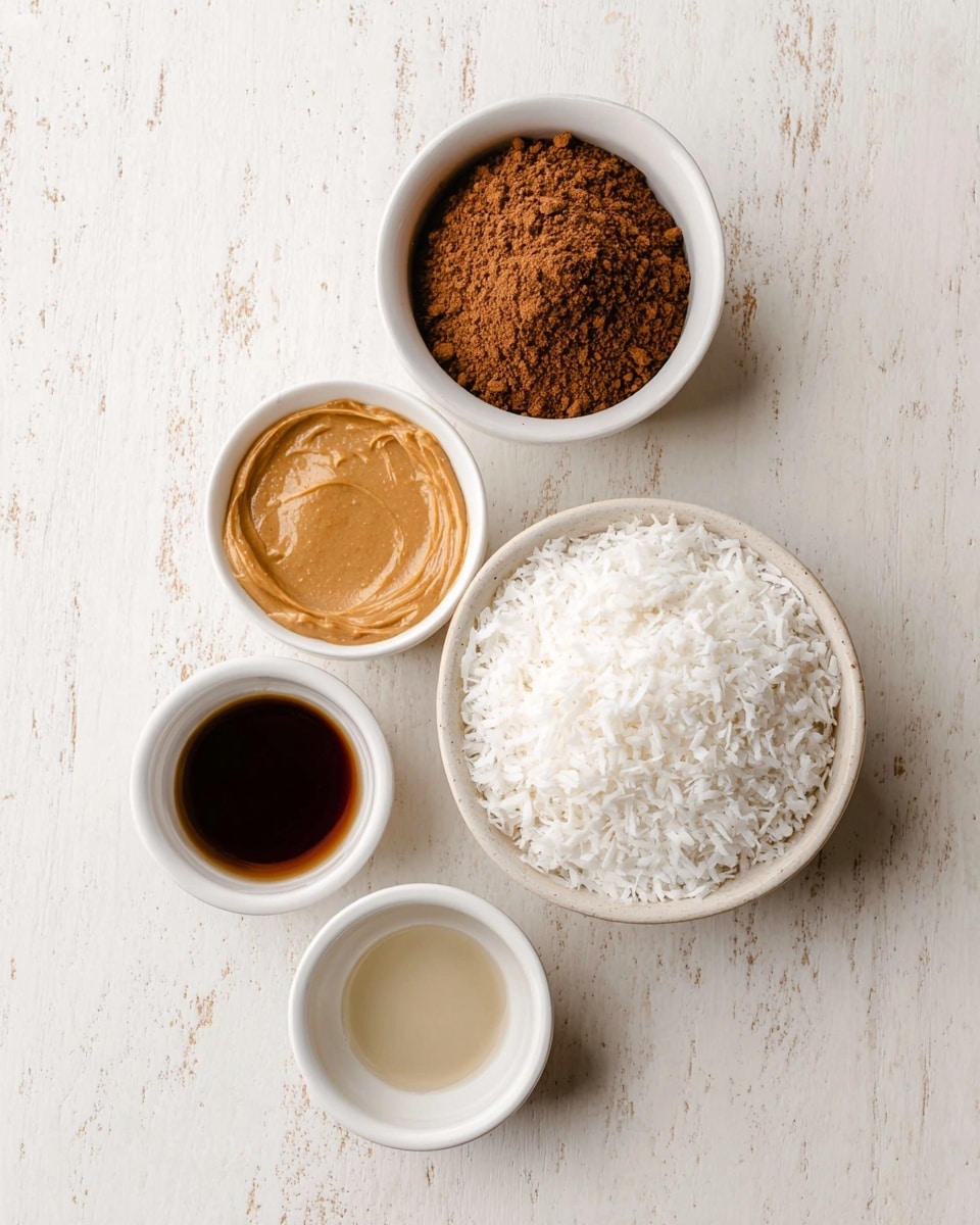 The image shows five small white bowls on a white marbled surface. The biggest bowl at the bottom right is filled with white shredded coconut, looking fluffy and light. Above it to the left is a bowl with smooth, light brown peanut butter. To the top left is a bowl filled with brown cocoa powder, with a rough texture. Above and slightly to the right of the peanut butter bowl is a bowl with a clear, light liquid. The bottom left bowl contains a dark brown liquid, smooth and shiny. All bowls are evenly spaced and arranged in a loose diamond shape. Photo taken with an iphone --ar 4:5 --v 7