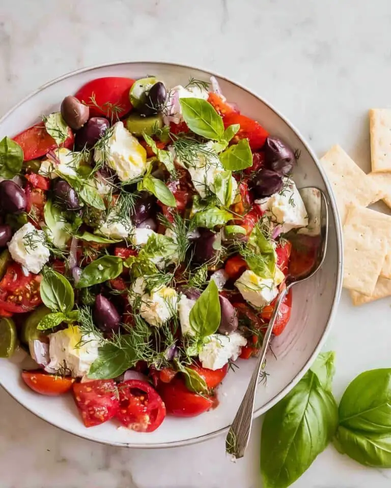 Burrata Salad with Cucumbers, Tomatoes, Kalamata Olives, and Fresh Herbs Recipe