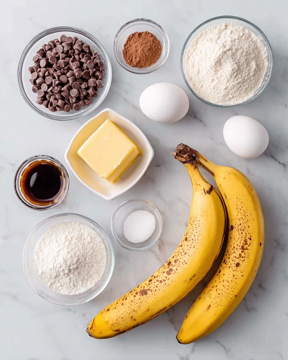 The image shows two ripe yellow bananas with brown spots lying side by side on a white marbled surface. Around them are several small containers: one with brown powder, one with fine white salt, one with yellow butter in a white dish, a small bowl of dark vanilla extract, a glass bowl full of small brown chocolate chips, a small bowl of white granulated sugar, a small glass bowl of white powder (likely baking powder), and a glass bowl of white flour. Three white eggs are placed close to the butter on the upper right side. Everything is neatly arranged and viewed from above. photo taken with an iphone --ar 4:5 --v 7