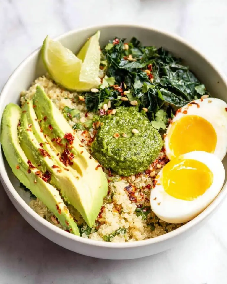 Savory Quinoa Breakfast Bowl with Kale, Avocado, Eggs, and Pesto Recipe