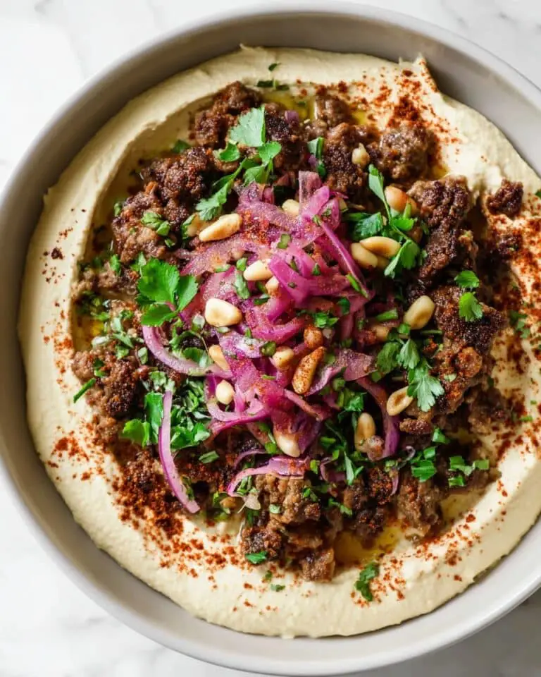 Spiced Ground Beef over Creamy Hummus with Pickled Onions and Fresh Herbs Recipe