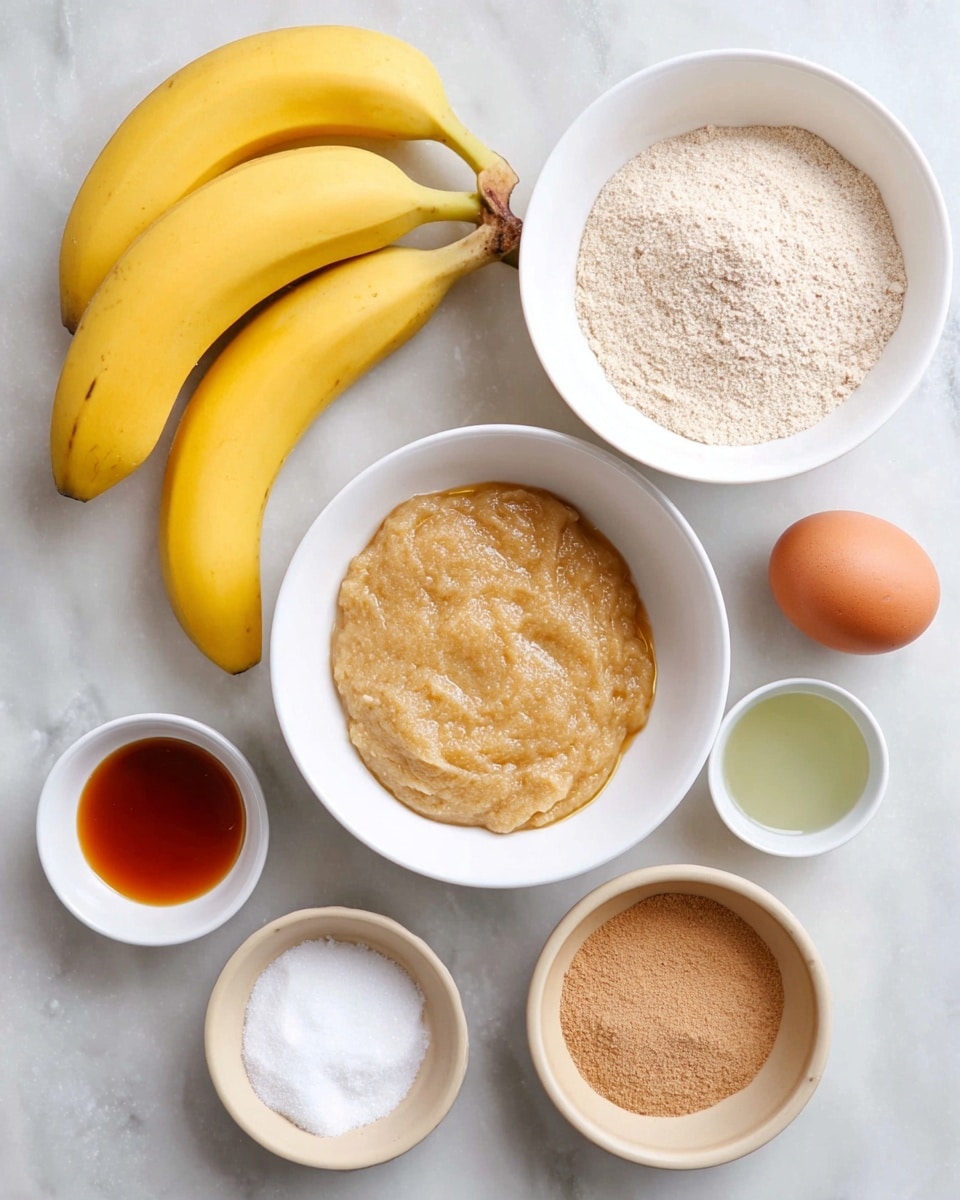 The image shows several ingredients arranged on a white marbled surface. There are two bright yellow bananas placed near the top right, close to a single brown egg. A large white bowl contains a light beige, mashed mixture in the center. Above it, another white bowl is filled with a fine, light brown powder. Near the bottom, there is a small white bowl with a dark amber liquid, and next to it a white bowl with a greenish liquid. On the far right, a small white plate holds white sugar and a light brown powder, while below it, a beige bowl contains a smooth, light brown paste. photo taken with an iphone --ar 4:5 --v 7